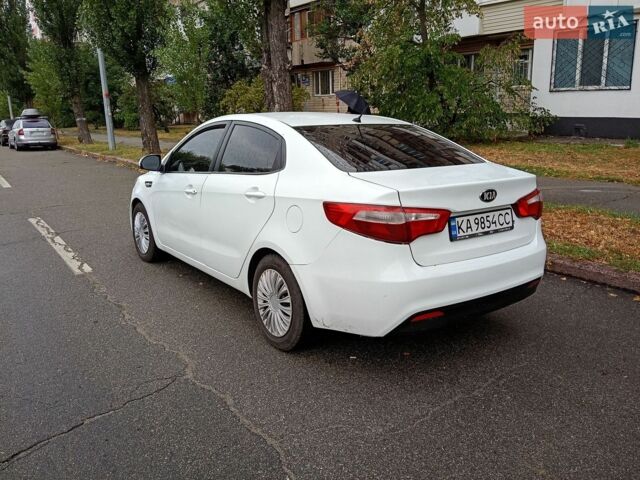 Белый Киа Рио, объемом двигателя 1.4 л и пробегом 250 тыс. км за 7800 $, фото 2 на Automoto.ua