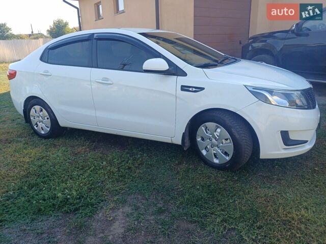 Белый Киа Рио, объемом двигателя 1.4 л и пробегом 82 тыс. км за 8000 $, фото 3 на Automoto.ua
