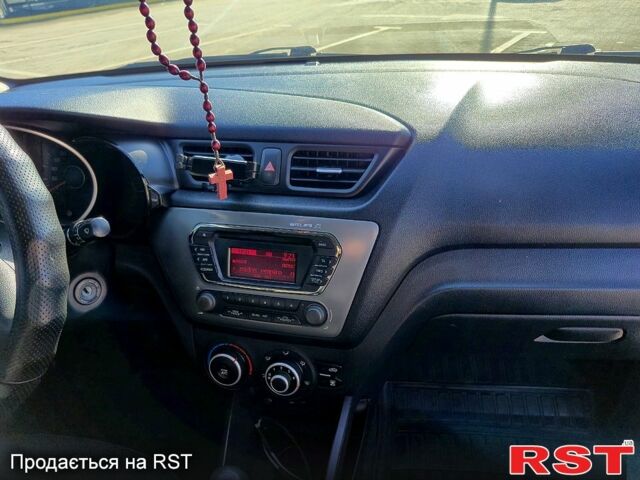 Белый Киа Рио, объемом двигателя 1.4 л и пробегом 176 тыс. км за 8499 $, фото 7 на Automoto.ua