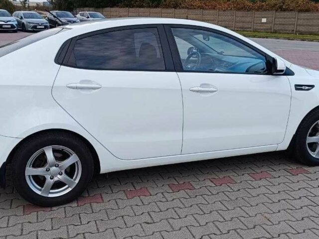 Білий Кіа Ріо, об'ємом двигуна 1.4 л та пробігом 99 тис. км за 9000 $, фото 4 на Automoto.ua