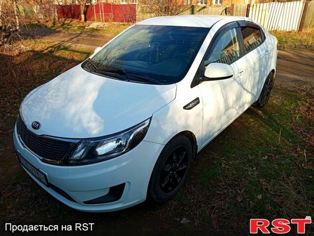 Білий Кіа Ріо, об'ємом двигуна 1.4 л та пробігом 87 тис. км за 7500 $, фото 5 на Automoto.ua