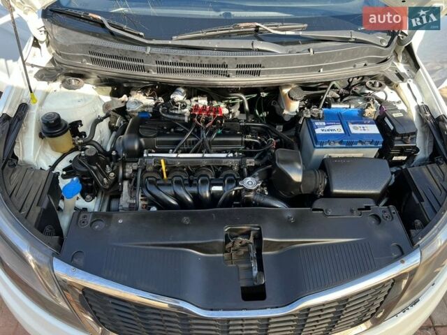 Білий Кіа Ріо, об'ємом двигуна 1.4 л та пробігом 210 тис. км за 5800 $, фото 20 на Automoto.ua
