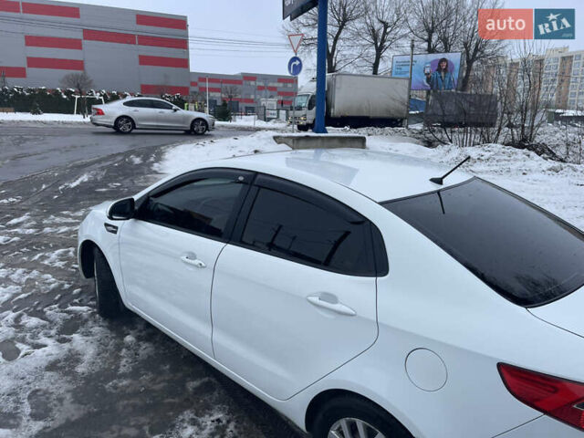 Білий Кіа Ріо, об'ємом двигуна 1.4 л та пробігом 216 тис. км за 7850 $, фото 13 на Automoto.ua