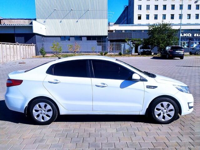 Білий Кіа Ріо, об'ємом двигуна 1.4 л та пробігом 165 тис. км за 7300 $, фото 1 на Automoto.ua