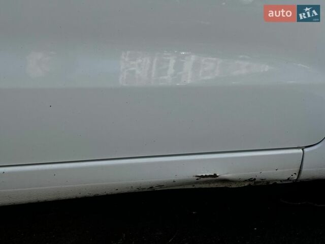 Белый Киа Рио, объемом двигателя 1.4 л и пробегом 176 тыс. км за 7500 $, фото 1 на Automoto.ua