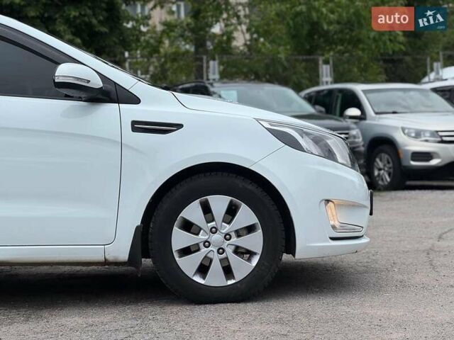 Белый Киа Рио, объемом двигателя 1.6 л и пробегом 105 тыс. км за 7790 $, фото 12 на Automoto.ua