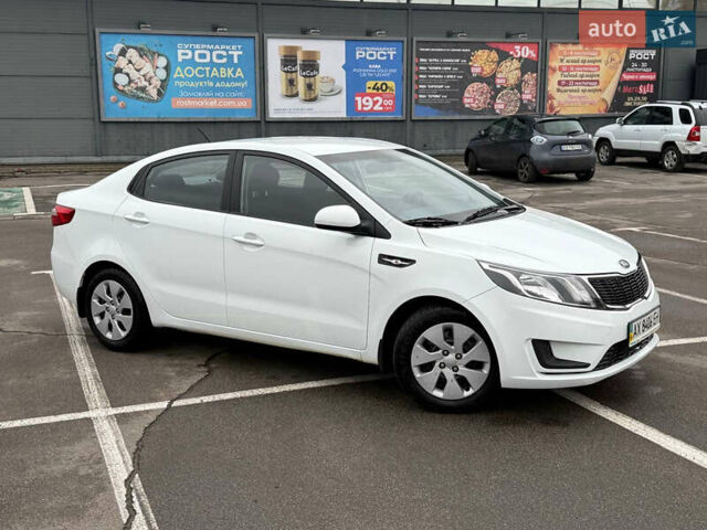 Белый Киа Рио, объемом двигателя 1.4 л и пробегом 23 тыс. км за 9900 $, фото 4 на Automoto.ua