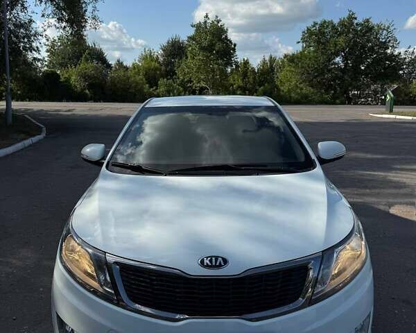 Білий Кіа Ріо, об'ємом двигуна 1.59 л та пробігом 106 тис. км за 8400 $, фото 21 на Automoto.ua