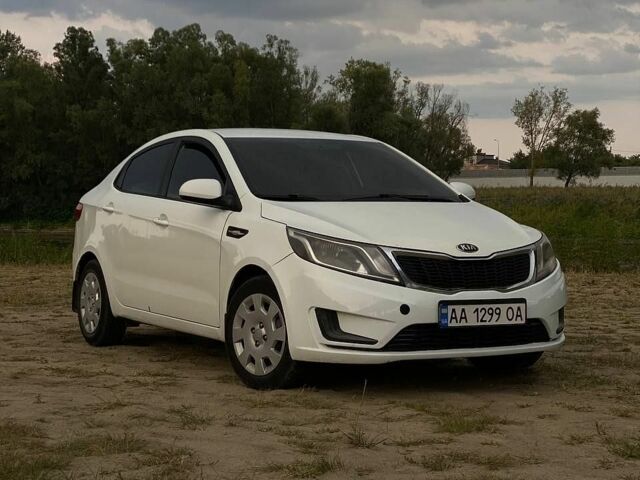 Білий Кіа Ріо, об'ємом двигуна 1.4 л та пробігом 258 тис. км за 6200 $, фото 20 на Automoto.ua