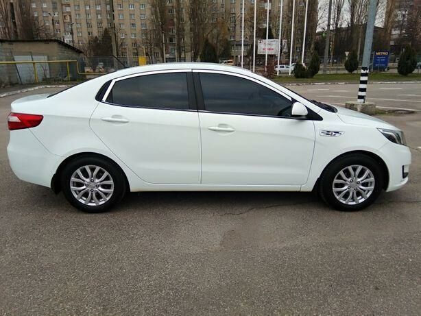 Белый Киа Рио, объемом двигателя 1.4 л и пробегом 83 тыс. км за 10200 $, фото 1 на Automoto.ua
