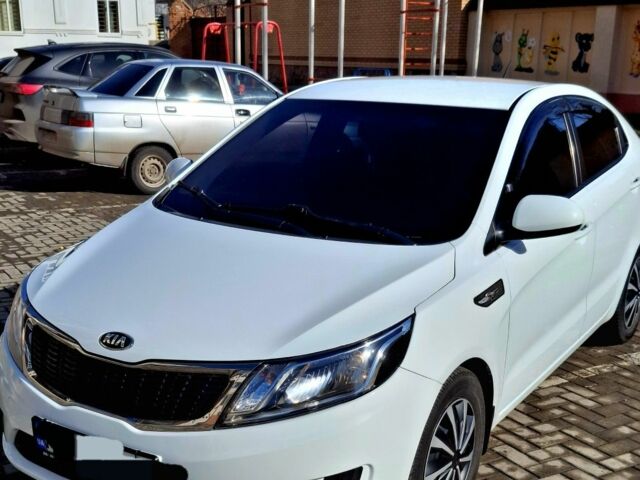 Белый Киа Рио, объемом двигателя 1.4 л и пробегом 87 тыс. км за 8750 $, фото 1 на Automoto.ua