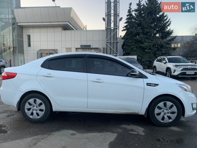 Белый Киа Рио, объемом двигателя 1.4 л и пробегом 216 тыс. км за 8555 $, фото 1 на Automoto.ua