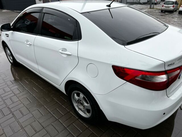 Белый Киа Рио, объемом двигателя 1.4 л и пробегом 106 тыс. км за 8500 $, фото 2 на Automoto.ua