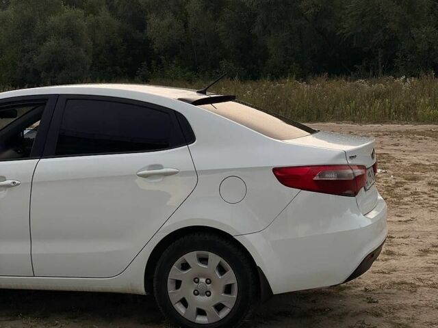 Білий Кіа Ріо, об'ємом двигуна 1.4 л та пробігом 258 тис. км за 6200 $, фото 3 на Automoto.ua