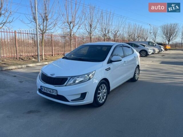 Белый Киа Рио, объемом двигателя 1.4 л и пробегом 216 тыс. км за 7400 $, фото 2 на Automoto.ua