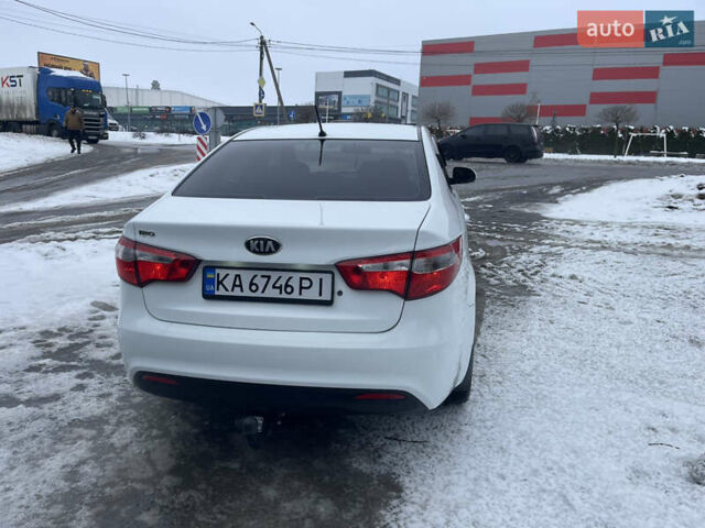 Білий Кіа Ріо, об'ємом двигуна 1.4 л та пробігом 216 тис. км за 7850 $, фото 9 на Automoto.ua