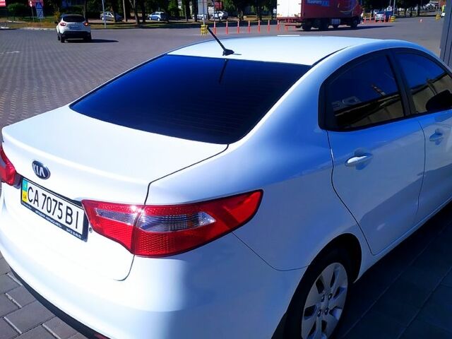 Білий Кіа Ріо, об'ємом двигуна 1.4 л та пробігом 165 тис. км за 7300 $, фото 2 на Automoto.ua