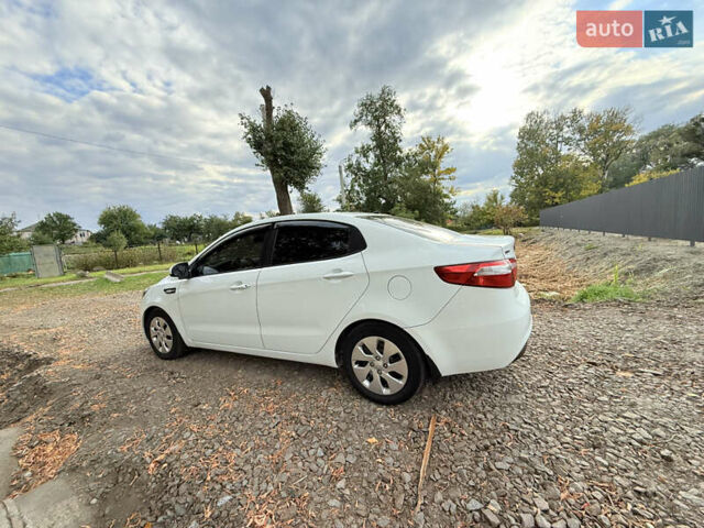 Белый Киа Рио, объемом двигателя 1.4 л и пробегом 299 тыс. км за 6100 $, фото 22 на Automoto.ua