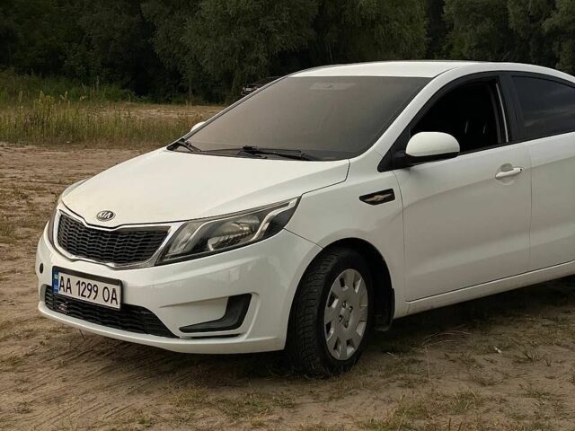 Білий Кіа Ріо, об'ємом двигуна 1.4 л та пробігом 258 тис. км за 6200 $, фото 1 на Automoto.ua