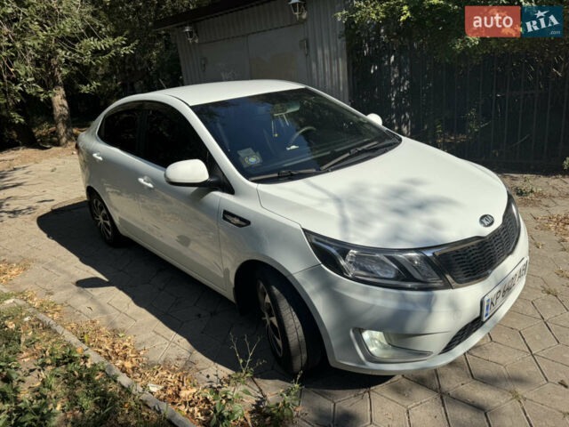 Білий Кіа Ріо, об'ємом двигуна 1.4 л та пробігом 94 тис. км за 7400 $, фото 4 на Automoto.ua