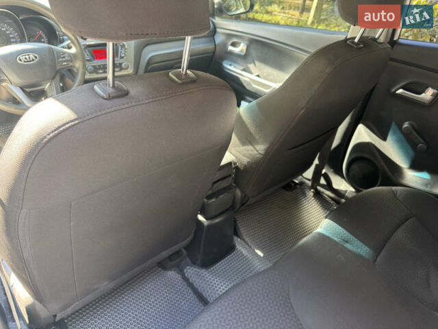 Білий Кіа Ріо, об'ємом двигуна 1.4 л та пробігом 94 тис. км за 7400 $, фото 15 на Automoto.ua