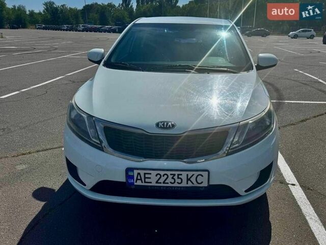 Білий Кіа Ріо, об'ємом двигуна 1.4 л та пробігом 179 тис. км за 7600 $, фото 1 на Automoto.ua