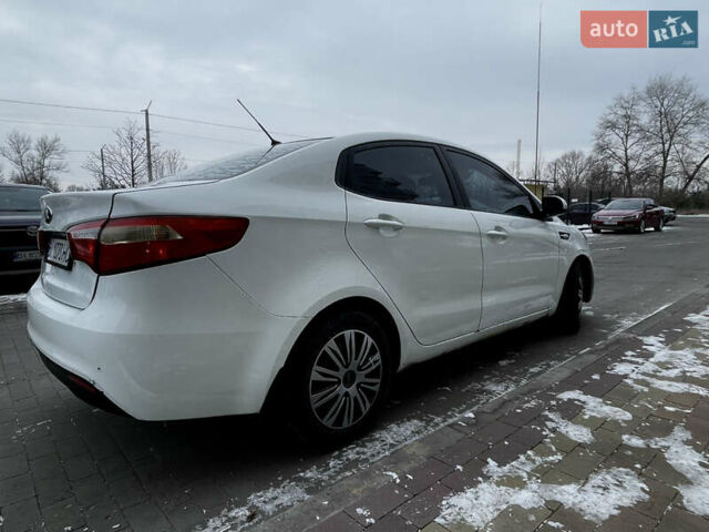 Білий Кіа Ріо, об'ємом двигуна 1.4 л та пробігом 210 тис. км за 6050 $, фото 6 на Automoto.ua