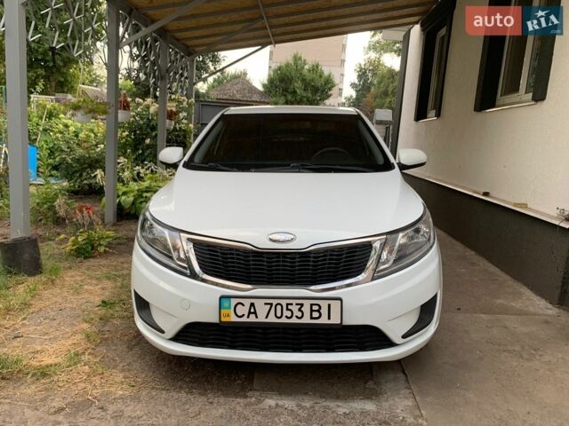 Белый Киа Рио, объемом двигателя 1.4 л и пробегом 195 тыс. км за 7500 $, фото 2 на Automoto.ua
