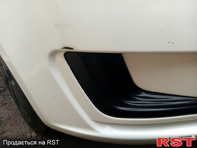 Білий Кіа Ріо, об'ємом двигуна 1.4 л та пробігом 87 тис. км за 7500 $, фото 12 на Automoto.ua