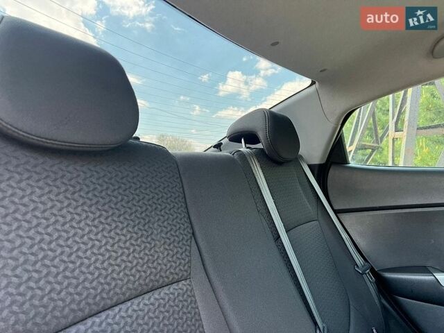 Белый Киа Рио, объемом двигателя 1.4 л и пробегом 140 тыс. км за 8900 $, фото 16 на Automoto.ua