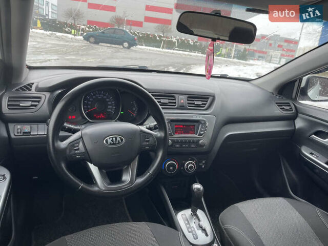 Білий Кіа Ріо, об'ємом двигуна 1.4 л та пробігом 216 тис. км за 7850 $, фото 34 на Automoto.ua