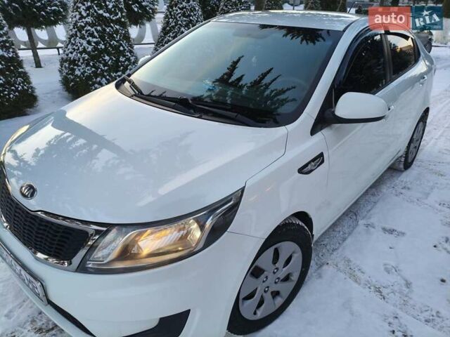 Белый Киа Рио, объемом двигателя 1.4 л и пробегом 144 тыс. км за 7700 $, фото 1 на Automoto.ua