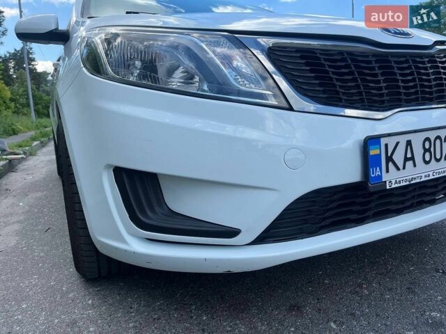 Білий Кіа Ріо, об'ємом двигуна 1.4 л та пробігом 132 тис. км за 6600 $, фото 16 на Automoto.ua