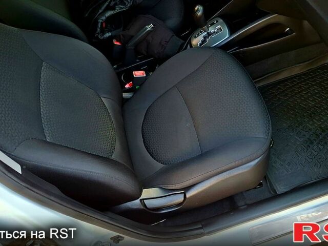 Білий Кіа Ріо, об'ємом двигуна 1.4 л та пробігом 87 тис. км за 8750 $, фото 9 на Automoto.ua