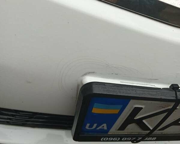 Білий Кіа Ріо, об'ємом двигуна 1.4 л та пробігом 87 тис. км за 8000 $, фото 16 на Automoto.ua