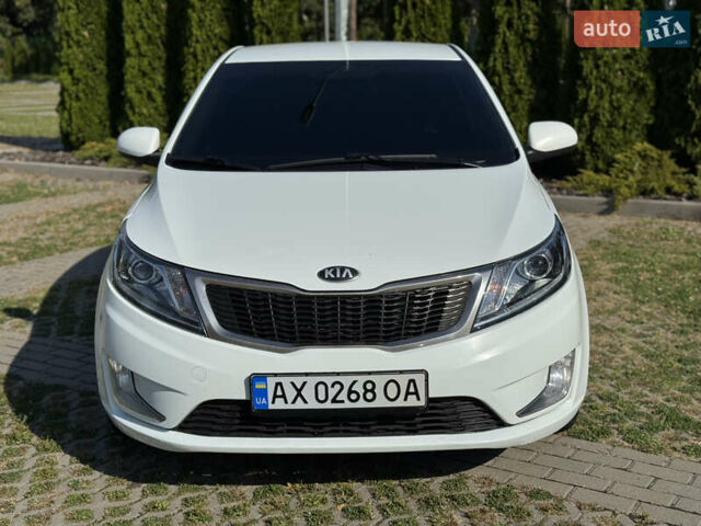 Білий Кіа Ріо, об'ємом двигуна 1.4 л та пробігом 185 тис. км за 6999 $, фото 1 на Automoto.ua