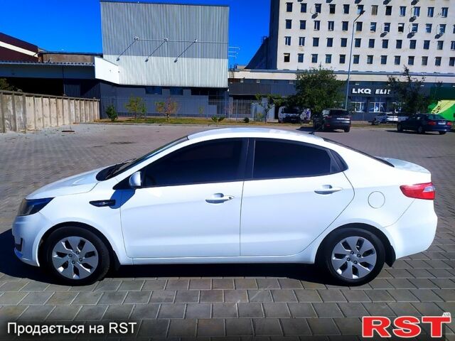 Білий Кіа Ріо, об'ємом двигуна 1.4 л та пробігом 165 тис. км за 7300 $, фото 5 на Automoto.ua