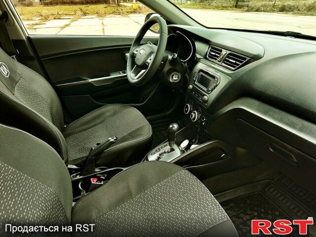 Белый Киа Рио, объемом двигателя 1.4 л и пробегом 155 тыс. км за 8300 $, фото 4 на Automoto.ua