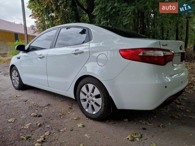 Білий Кіа Ріо, об'ємом двигуна 1.59 л та пробігом 172 тис. км за 9000 $, фото 3 на Automoto.ua