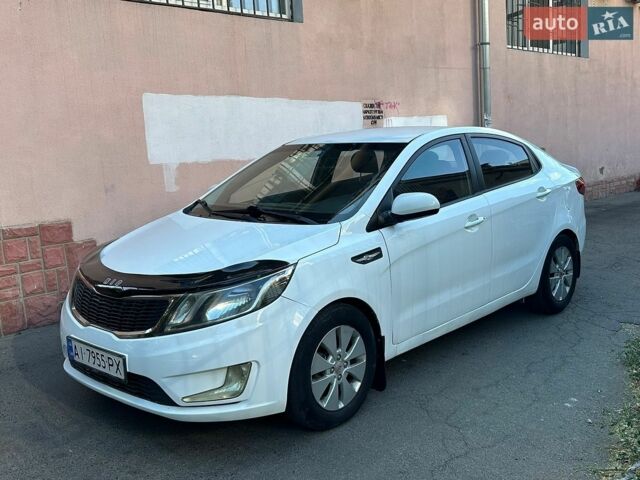 Білий Кіа Ріо, об'ємом двигуна 1.4 л та пробігом 214 тис. км за 6600 $, фото 1 на Automoto.ua