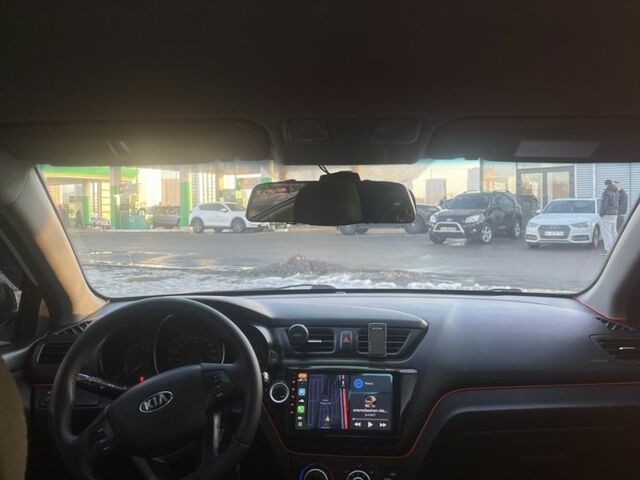 Білий Кіа Ріо, об'ємом двигуна 1.4 л та пробігом 248 тис. км за 7499 $, фото 4 на Automoto.ua