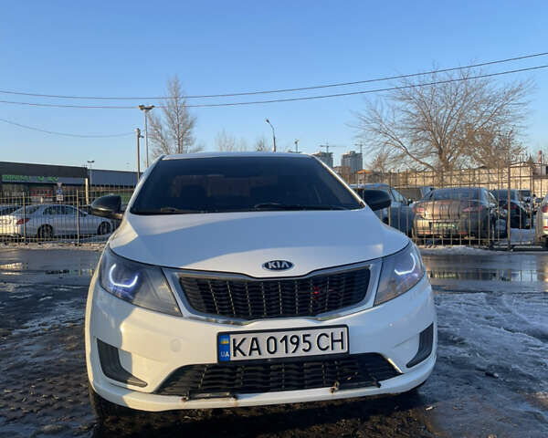 Білий Кіа Ріо, об'ємом двигуна 1.4 л та пробігом 248 тис. км за 7499 $, фото 1 на Automoto.ua