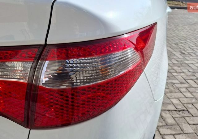 Белый Киа Рио, объемом двигателя 1.4 л и пробегом 87 тыс. км за 8750 $, фото 26 на Automoto.ua