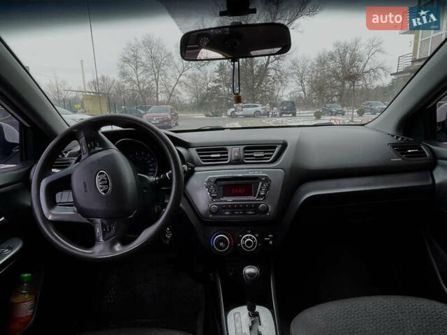 Білий Кіа Ріо, об'ємом двигуна 1.4 л та пробігом 210 тис. км за 6050 $, фото 11 на Automoto.ua