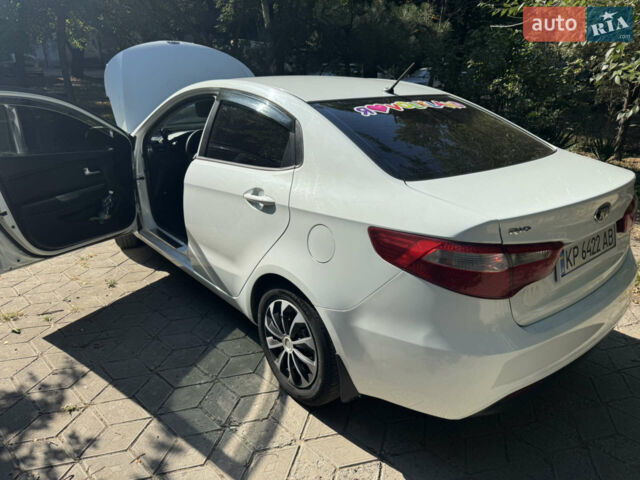 Білий Кіа Ріо, об'ємом двигуна 1.4 л та пробігом 94 тис. км за 7400 $, фото 24 на Automoto.ua