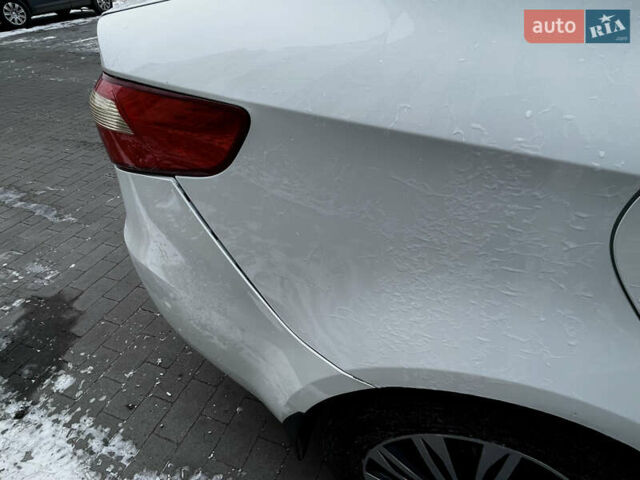 Білий Кіа Ріо, об'ємом двигуна 1.4 л та пробігом 210 тис. км за 6050 $, фото 16 на Automoto.ua