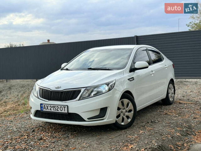 Білий Кіа Ріо, об'ємом двигуна 1.4 л та пробігом 299 тис. км за 6100 $, фото 25 на Automoto.ua