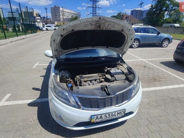 Белый Киа Рио, объемом двигателя 1.59 л и пробегом 130 тыс. км за 7400 $, фото 18 на Automoto.ua