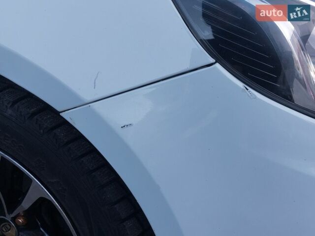 Білий Кіа Ріо, об'ємом двигуна 1.4 л та пробігом 139 тис. км за 7000 $, фото 7 на Automoto.ua