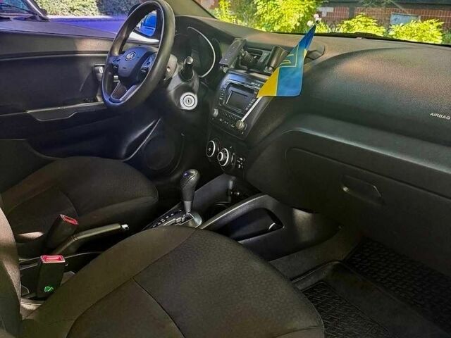 Білий Кіа Ріо, об'ємом двигуна 1.4 л та пробігом 179 тис. км за 7600 $, фото 9 на Automoto.ua